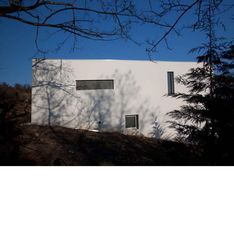 architecture, CHAPUIS ROYER ARCHITECTES, CORENC, maison, figure en H, patio, béton brut, Isère