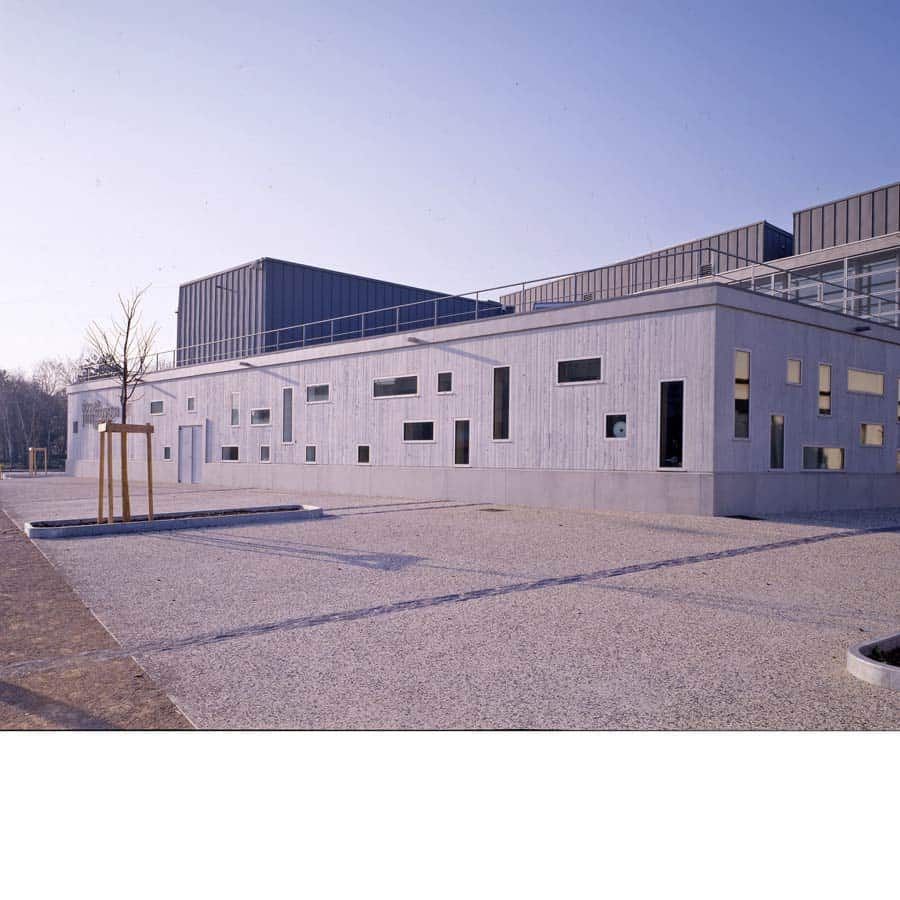 architecture CHAPUIS ROYER Vénissieux EQUIPEMENT école-de-musique béton brut zinc rue intérieure puits-de-lumière Rhône